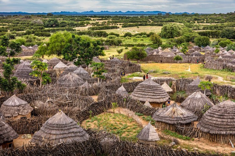  Karamojong people in traditional attire in Kidepo