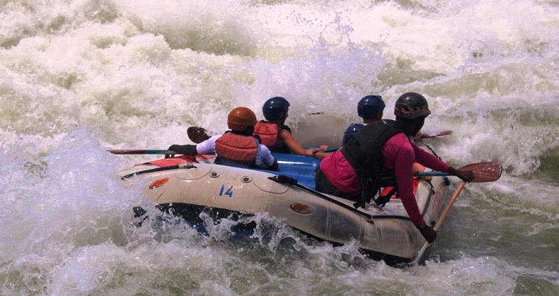 Rafters tackling the rapids on the Nile in Uganda